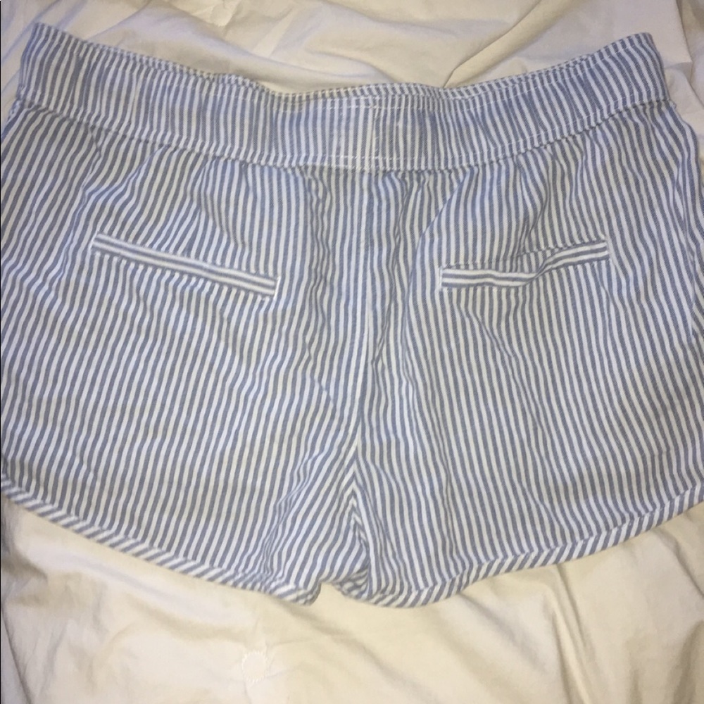 short shorts with blue and white stripes